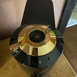 Nespresso Black and Gold Coffee Maker